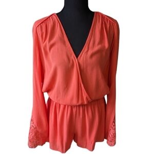 Guess women's size small romper in coral with long bell sleeves lace at cuff